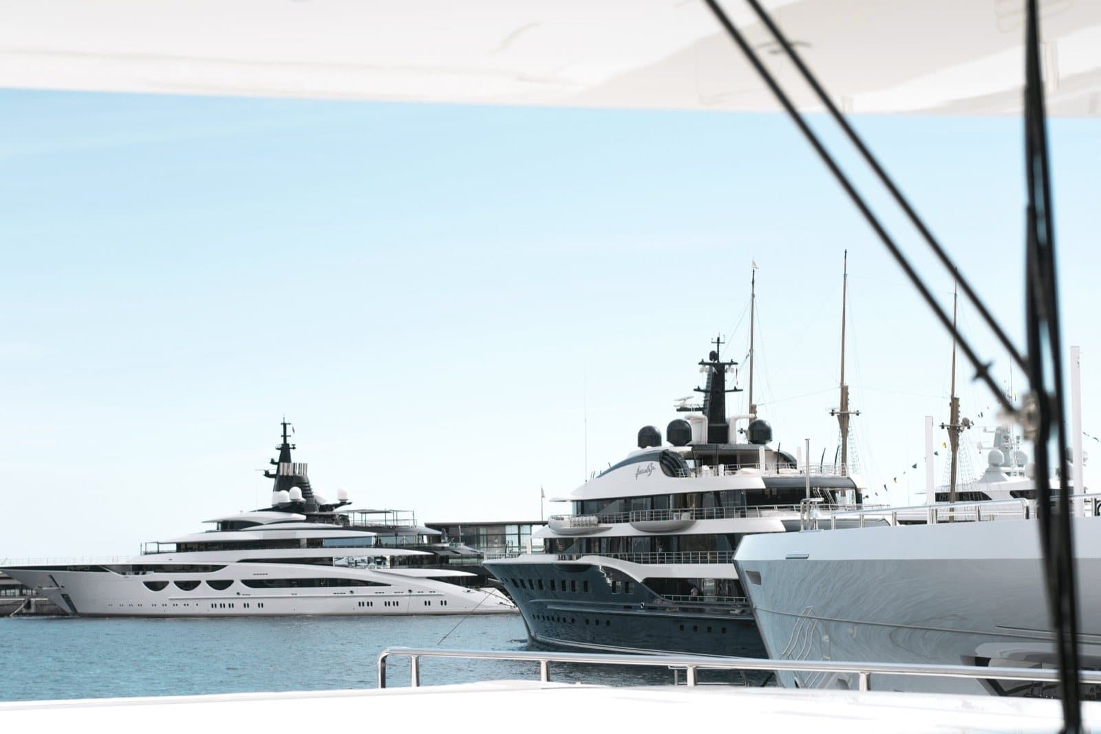 Superyacht crew preparing service in whites — Armada Club fleet, professionally vetted