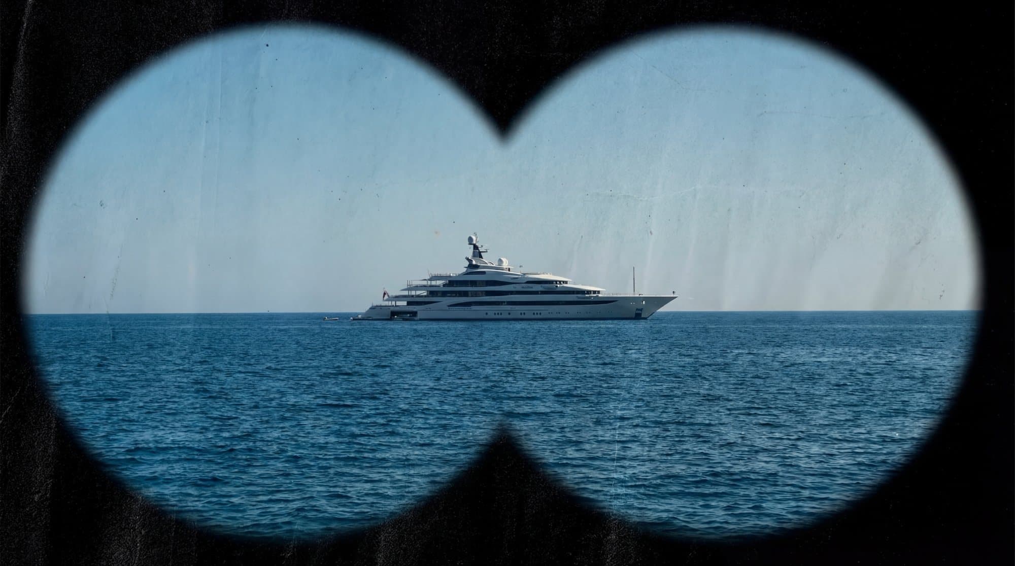 Superyacht at anchor in open water, one of the founding fleet available to Armada Club members